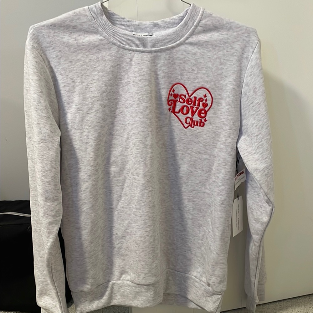 Gray Crew Neck Sweatshirt with Red Heart Graphic